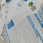 Le schede di ASQ Sinergie sui sistemi di gestione, a ventaglio, con gli ingranaggi grigi e i titoli blu